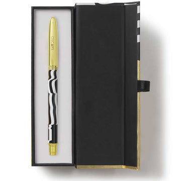 Gold pen with black and white striped design in a black gift box on a white background. official oscars academy awards logo merch
